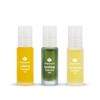 Three small frosted bottles containing yellow, green, and light yellow essences labeled Calming Essence, Soothing Essence, and Energizing Essence from Aromatherapy Collection | Shankara for skincare and wellness.