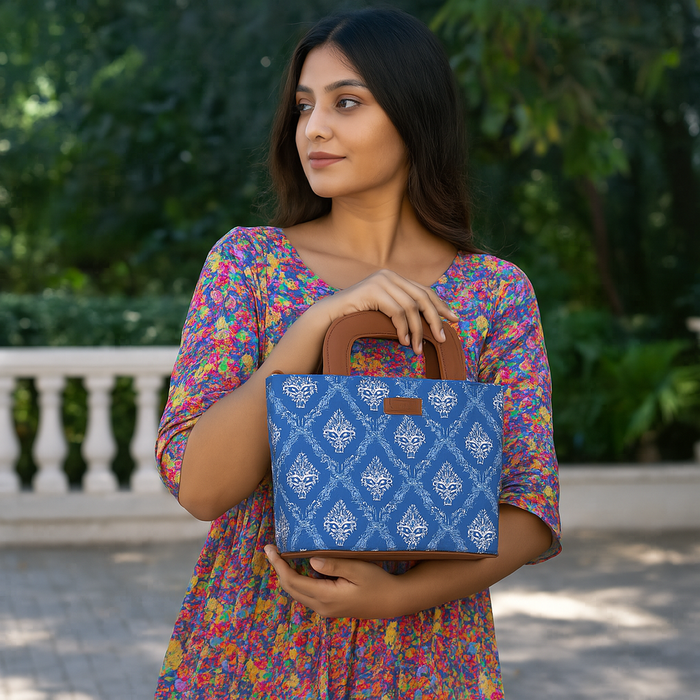 Women’s blue handcrafted printed canvas tote handbag with vegan leather handles for travel, work and everyday use-model image