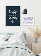 Heart of the Ocean is a minimalist illustration and typography of the words "heart of the ocean" written cursively with an anchor at the bottom.