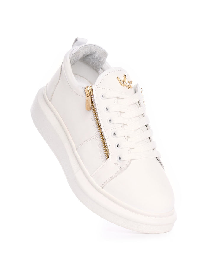 Martin Valen Hype Sole white leather sneaker, close-up top-side view showing gold zipper, crown emblem and laces