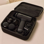 Black Hypervolt 3 | Hyperice percussion massage device with multiple attachment heads and charger neatly stored in a black carrying case for body care and recovery.