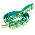 Dog leash with green and blue pattern on a white background