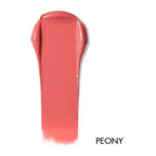 Swatch of lip & cheek cream in the shade 'Peony'. Warm medium pink.