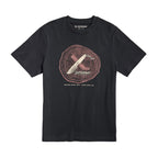 Front of the black Leatherman Blade & Grain tee  showcasing a fix blade knife and leather sheath on a stump