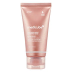 A pink tube packaging of Medicube Collagen Night Wrapping Mask with the product name and benefits listed on the front.