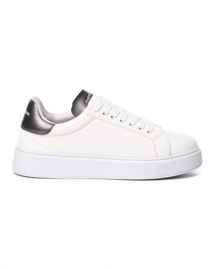 Martin Valen Iconic men's casual sneaker side profile in white with black heel tab and chunky white sole, close-up view