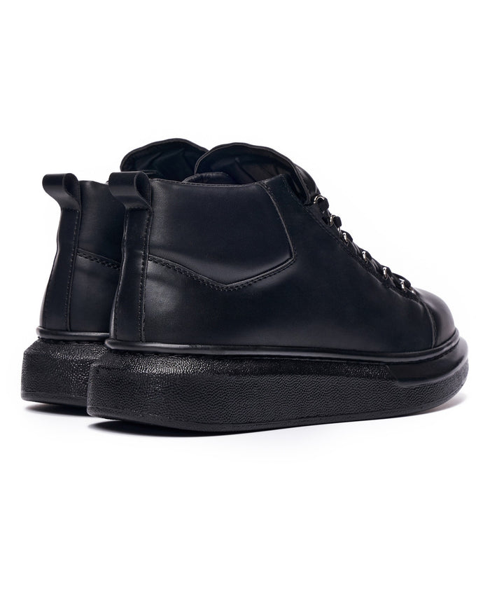 Martin Valen men's black high-top sneakers, rear three-quarter view showing heel pull tab and chunky sole