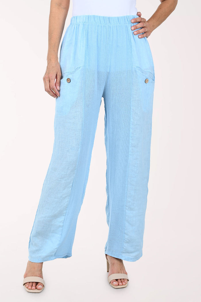 Light blue pants worn by a person on a white background