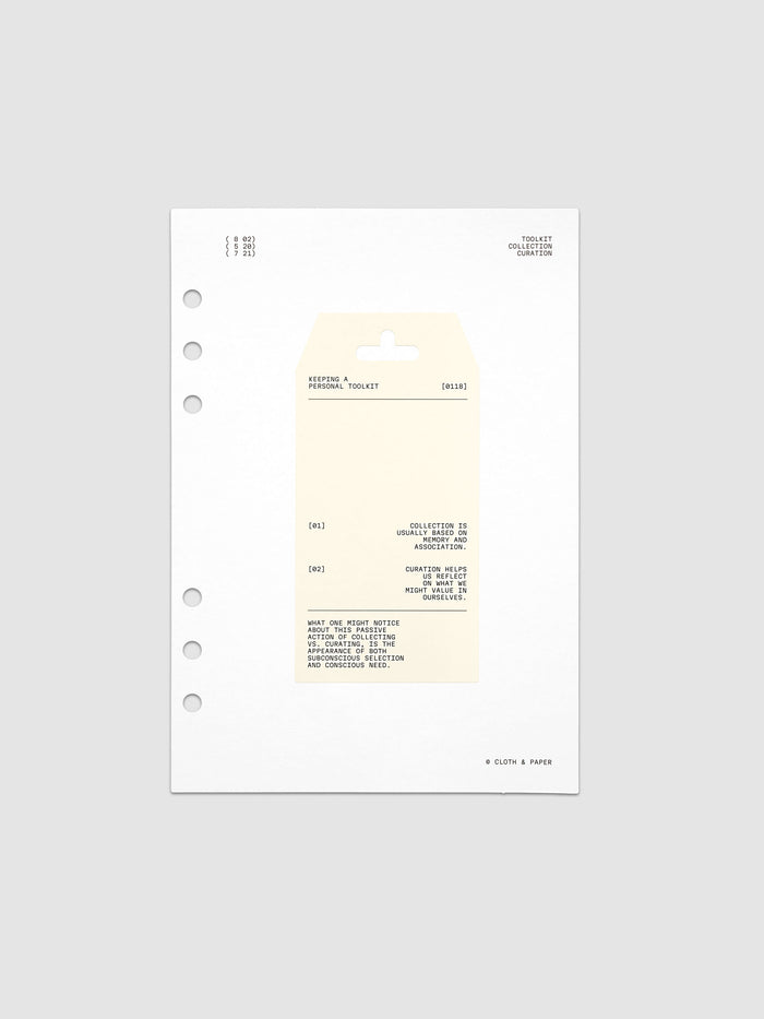 Personal Toolkit Planner Dashboard in A5 6-Ring Punch, a cardstock dashboard with an affixed warm gray printed tag in black type on a light gray background