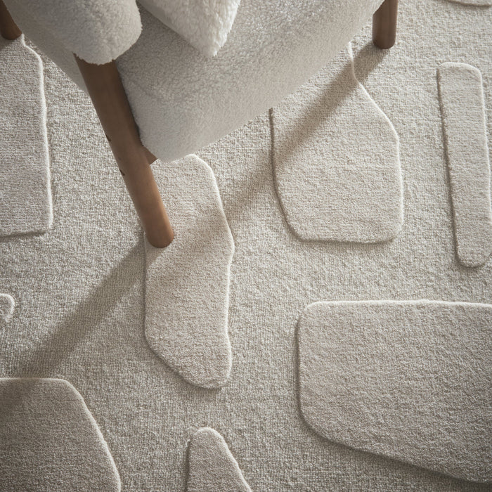 Sculptured Wool Stone Rug in Cream. 100% wool cut & loop pile rug in Cream with a patterned design.