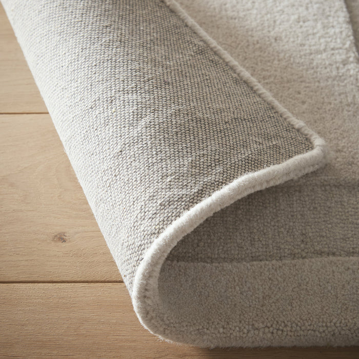Sculptured Wool Stone Rug in Cream. 100% wool cut & loop pile rug in Cream with a patterned design.