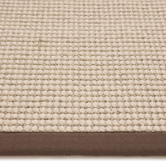 Sisal Boucle Mocha Rug made from 100% wool with a solid brown border.