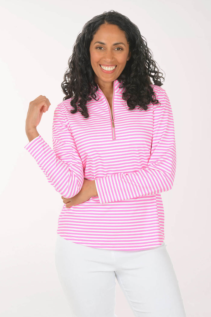 Woman wearing a pink and white striped long-sleeve shirt on a white background