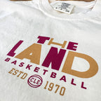 White sweatshirt with 'The Land Basketball' text and logo on a white background