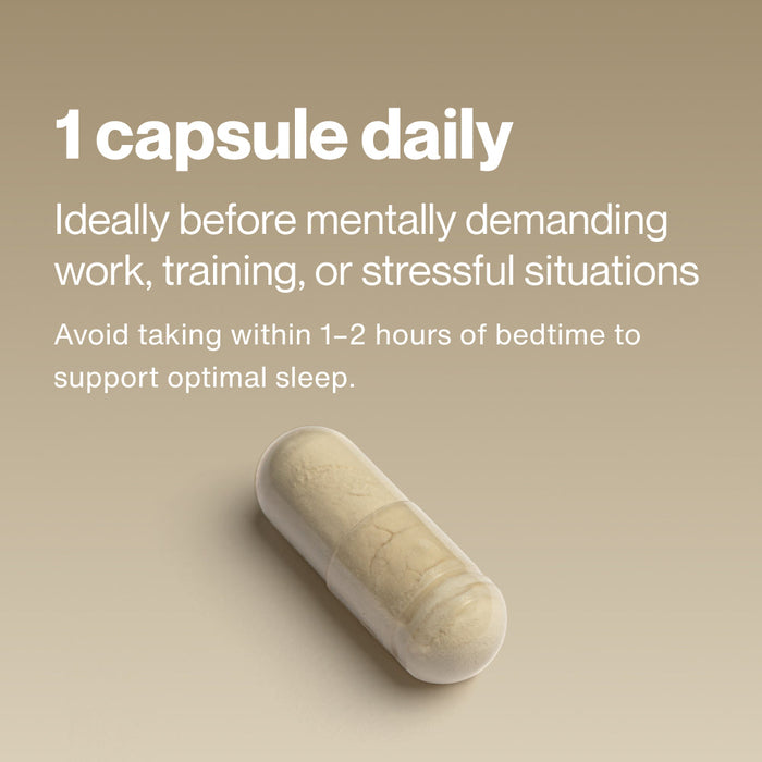 Instruction text explaining to take one Tyrosine capsule daily before mentally demanding work, training, or stressful situations, with a note to avoid taking it within 1-2 hours of bedtime, shown above a single beige capsule on a neutral background.