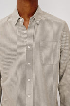 Vance button front collared shirt with long sleeves, collard stand buttons and a single chest pocket in Cedar Oat Stripe colorway. Front detail view shown on model.